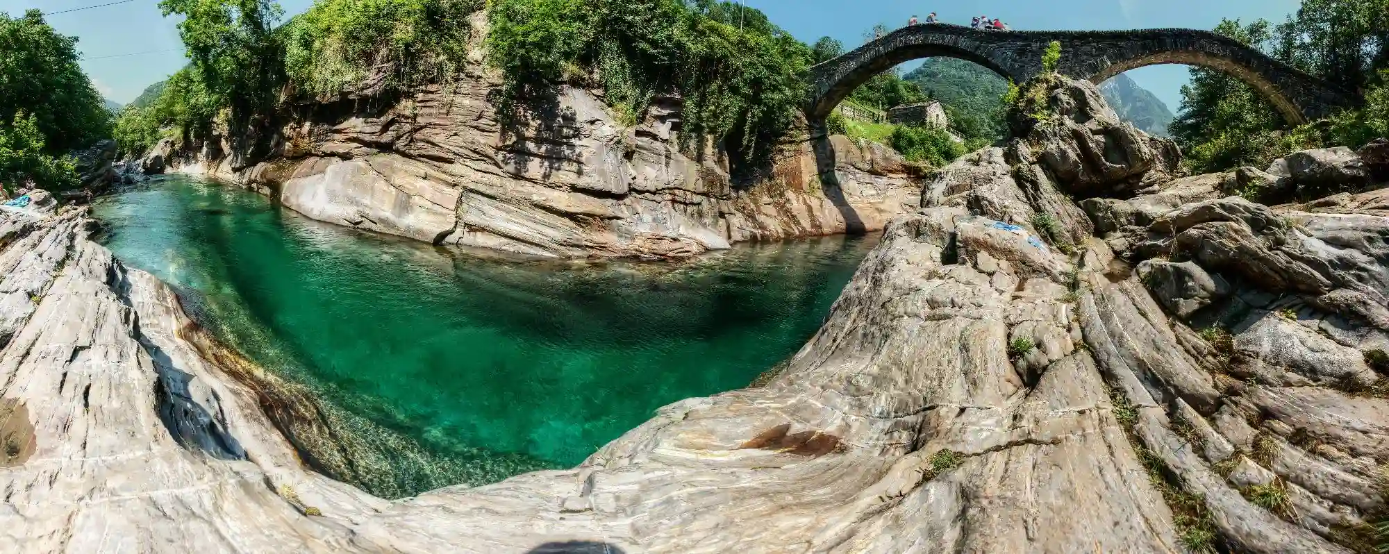 The Ponte dei Salti, famous double-humped mediaeval bridge in Lavertezzo, Switzerland, ponte dei salti, pedestrian, versasca, mediaeval, valle, rock, lavertezzo, stone, hiking, tessin, double, walking, italian, humped, famous, europe, jumps, tourism, ticino, bridge, village, swiss, salti, river, switzerland, ponte, double-hump