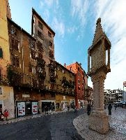 Dizzy rectilinear view of the Piazza Erbe in Verona, square, erbe, piazza, shakespeare, city, town, verona, italian, outdoors, veneto, sunny, italy, monument