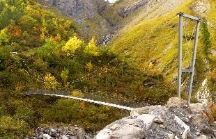 Suspension bridge at the Batöni, Weisstannen valley in Mels, Switzerland, null