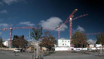 Construction site in Zürich, zürich, outdoors, sunshine, mountains, sky, alpine, swiss, town, switzerland, cranes, alps, city, construction, red, outdoor, daylight, blue, summer, site, work